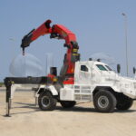 Armored crane vehicle